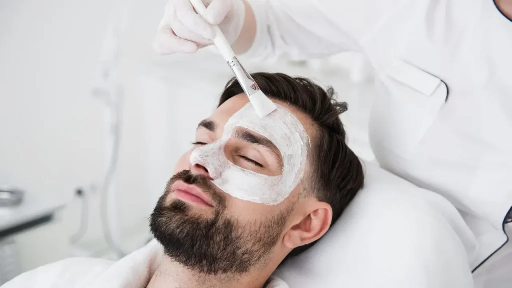Man receiving a medical facial mask treatment at a dermatology clinic